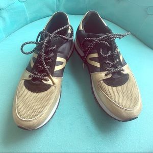 Tretorn Black and Gold Sneakers